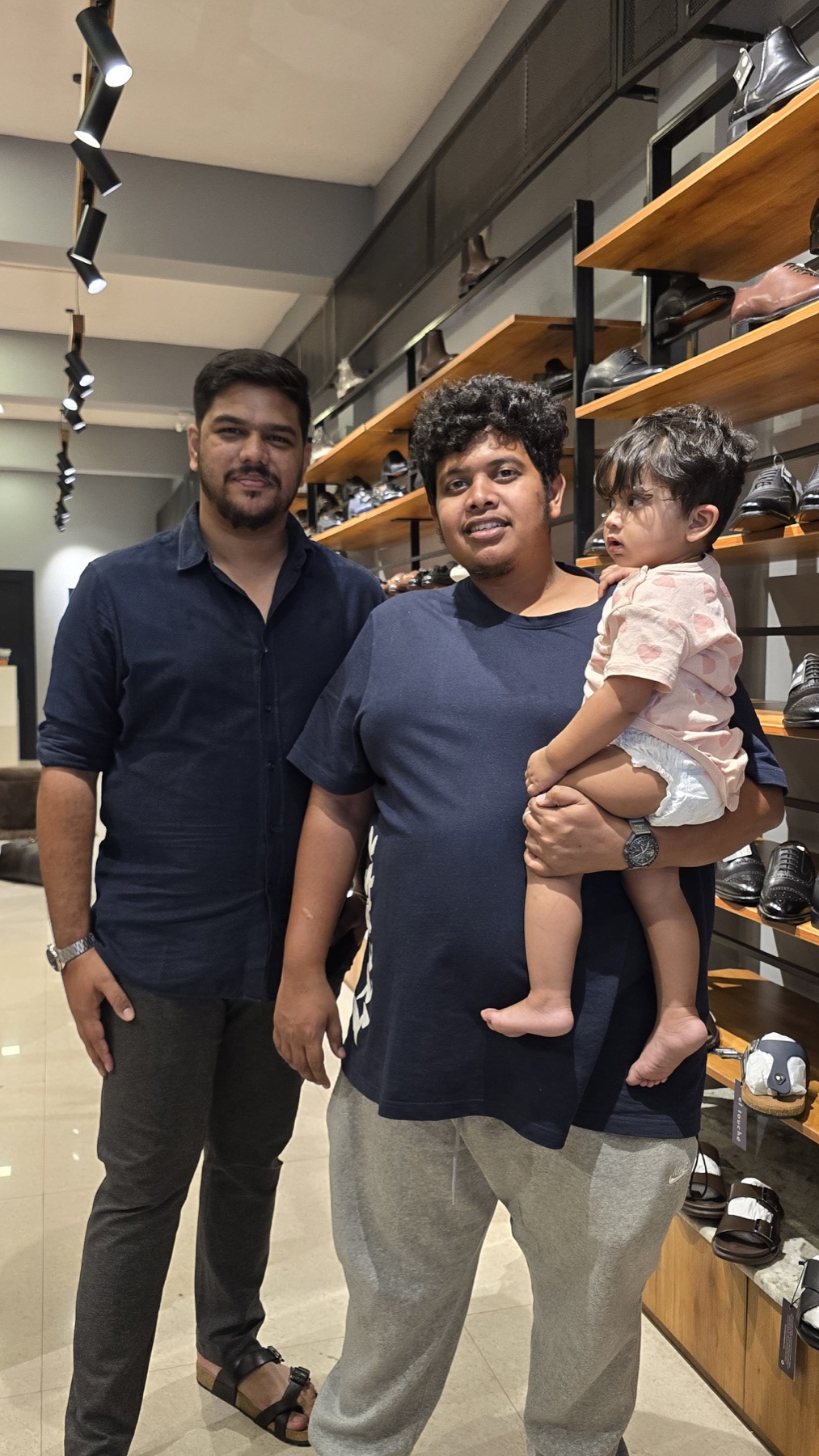 A family visiting POSH inside the Ambur store